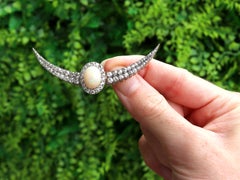 Victorian 4.75 Carat Opal and 4.45 Carat Diamond 9k Yellow Gold Crescent Brooch