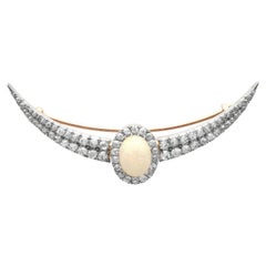 Victorian 4.75 Carat Opal and 4.45 Carat Diamond 9k Yellow Gold Crescent Brooch