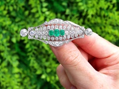 Art Deco 1.40 Carat Emerald and 6.20 Carat Diamond Platinum Brooch Circa 1930