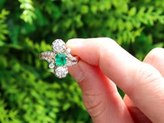 1.12 Carat Diamond & 0.60 Carat Emerald 18k Yellow Gold Twist Ring Circa 1880