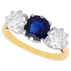 1.60 Carat Basaltic Sapphire and 0.98 Carat Diamond 18k Yellow Gold Trilogy Ring