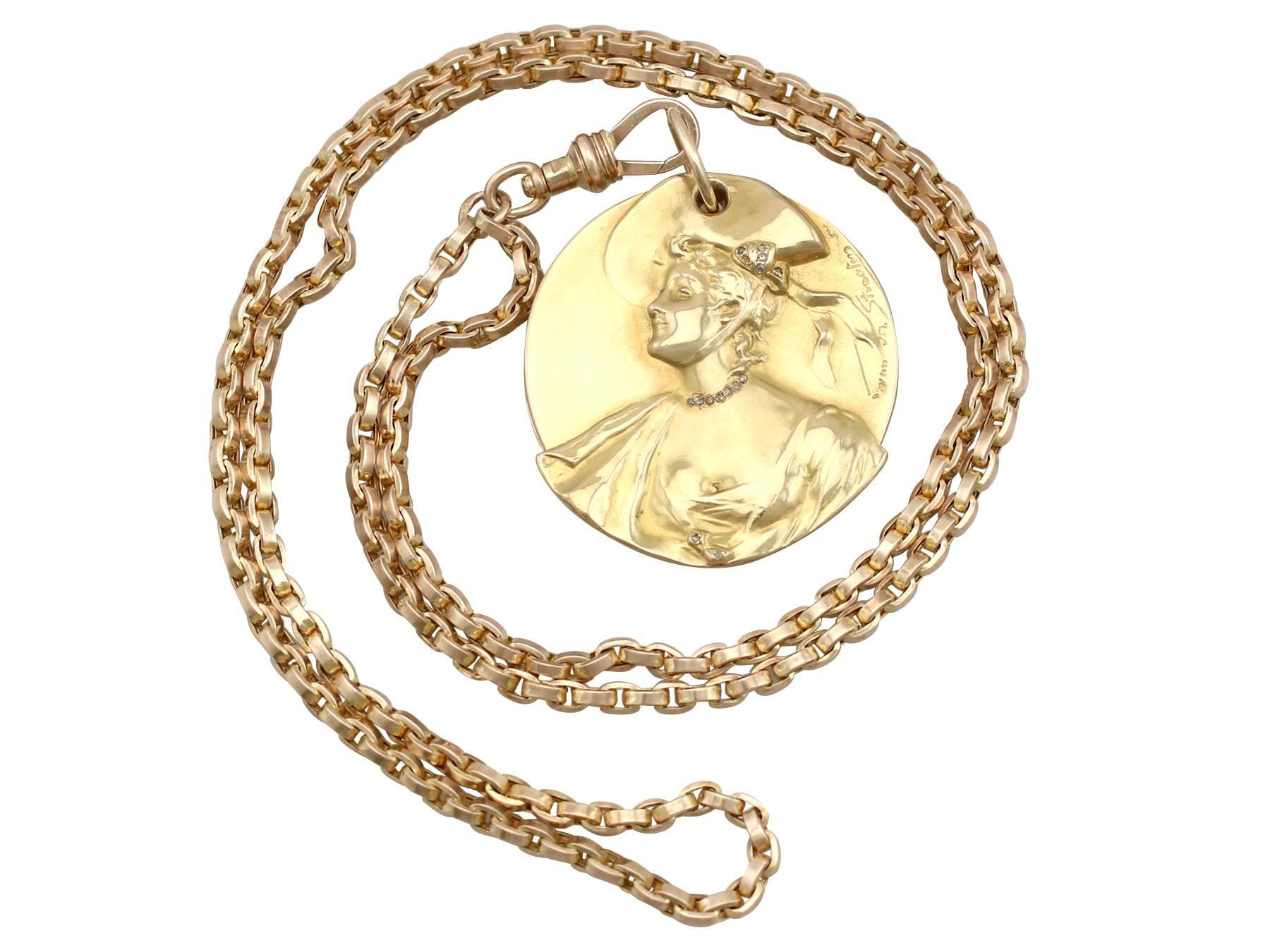 An exceptional antique 0.07 carat diamond and 18 carat yellow gold locket (circa 1920) with 9 carat yellow gold belcher chain (circa 1890).

This exceptional, fine and impressive antique French locket has been crafted in 18 ct yellow gold.

The