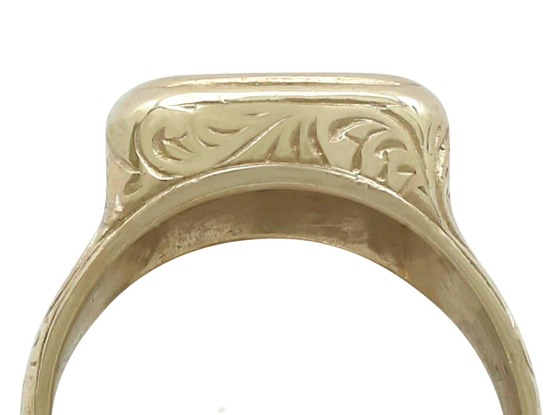 An impressive antique American 9 carat yellow gold signet ring; part of our diverse antique jewellery and estate jewelry collections.

This fine and impressive American signet ring has been crafted in 9 ct yellow gold.

The rounded rectangular