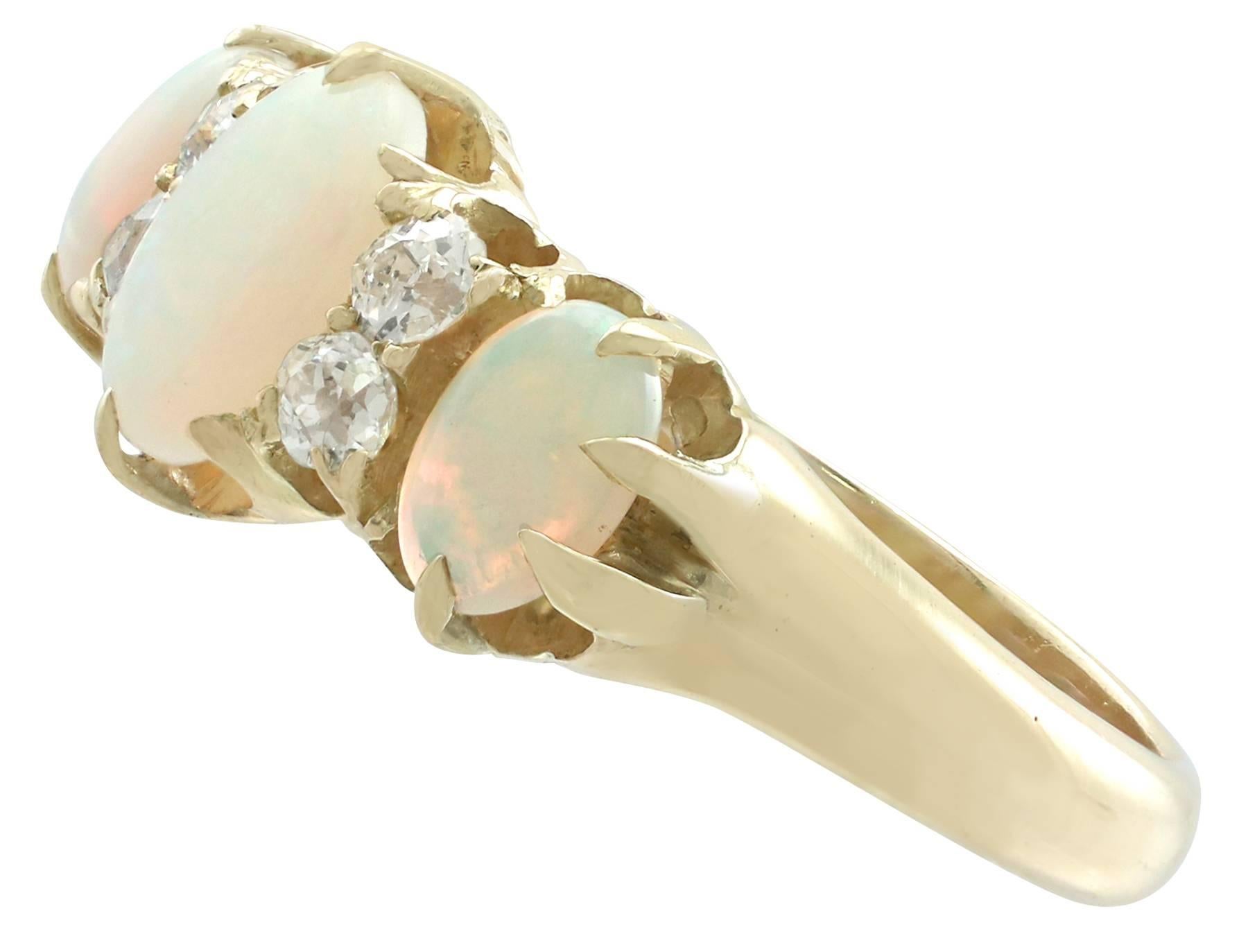 Women's Antique 1.25 Carat Opal 0.20 Carat Diamond 18 Karat Yellow Gold Trilogy Ring