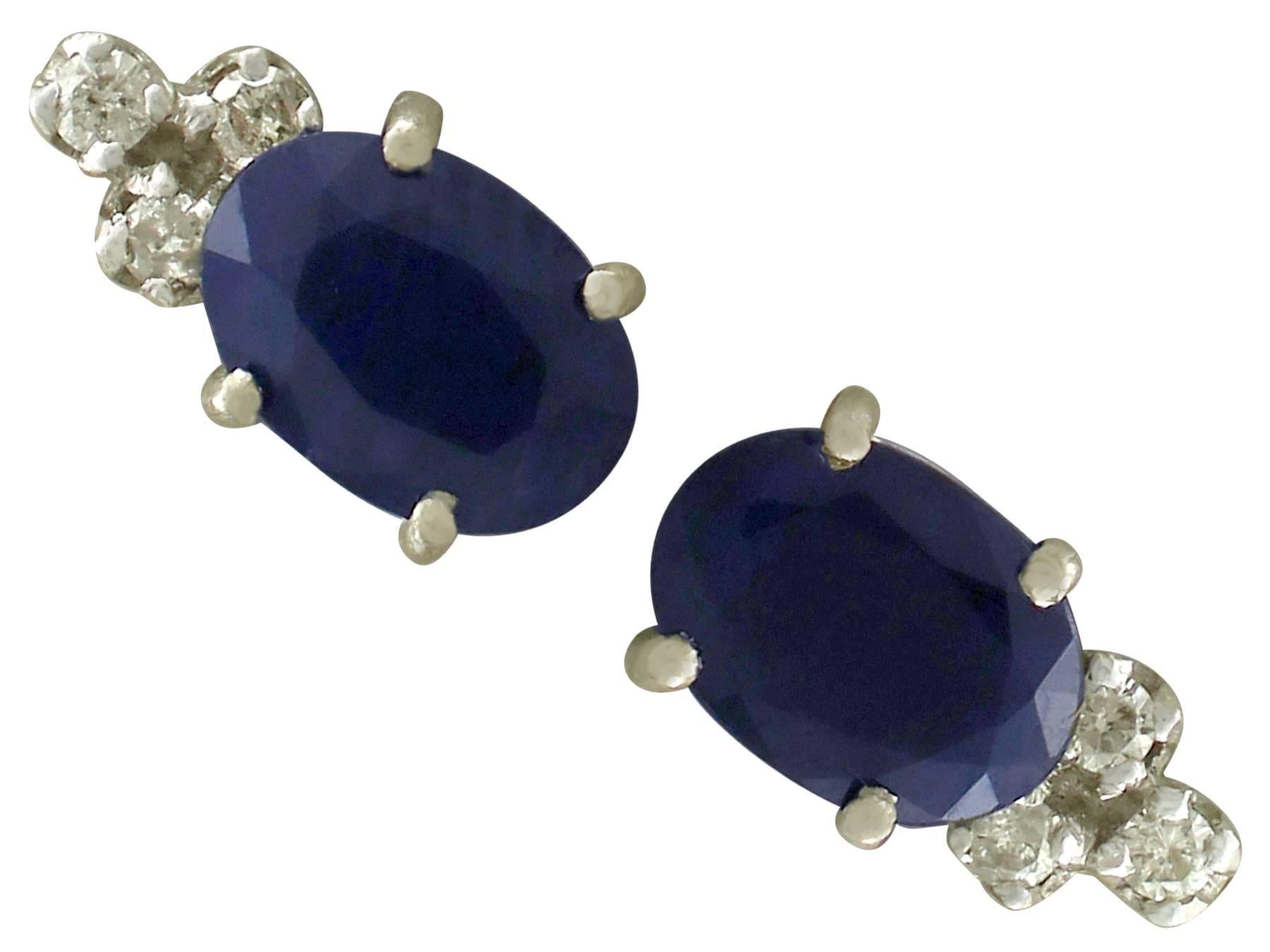 An impressive pair of 1.82 carat sapphire and 0.09 carat diamond, 18 carat white gold stud earrings; part of our diverse antique jewellery and estate jewelry collections.

These fine and impressive blue sapphire and diamond stud earrings have been