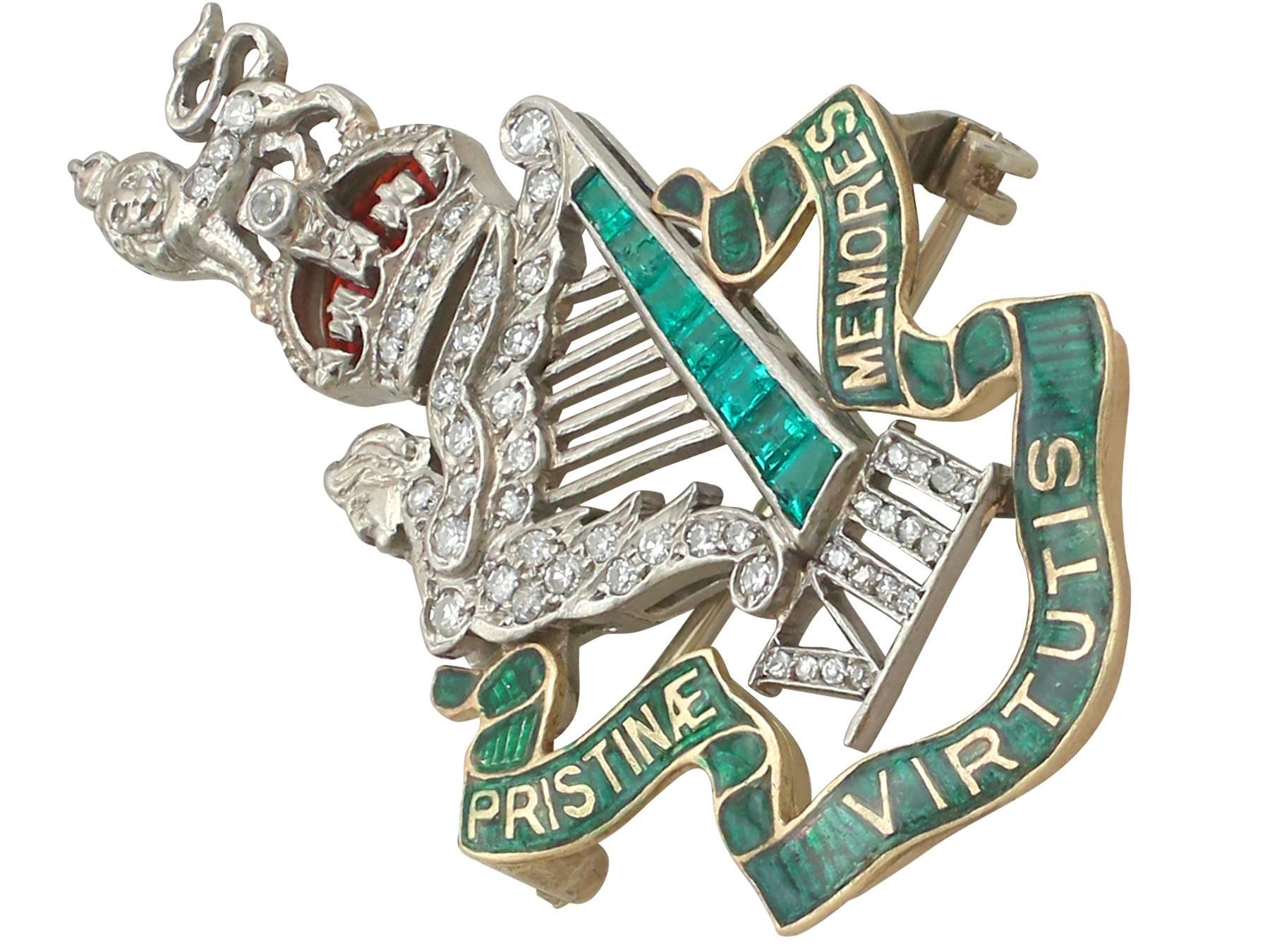 An impressive antique 0.28 carat diamond and 0.16 carat emerald, 14 karat yellow gold and platinum regimental brooch; part of our diverse antique jewellery collections.

This fine and impressive antique military brooch has been crafted in 14k yellow