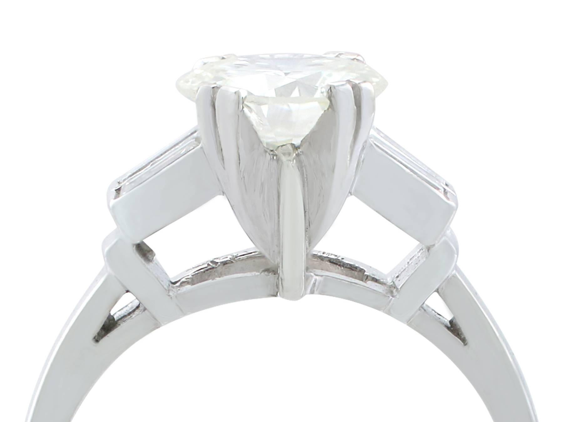 A fine vintage 1.90 carat (total) Art Deco solitaire diamond ring in platinum; part of our diverse range of diamond jewelry/jewelry.

This stunning vintage Art Deco style diamond ring has been crafted in platinum.

The feature 1.52ct transitional