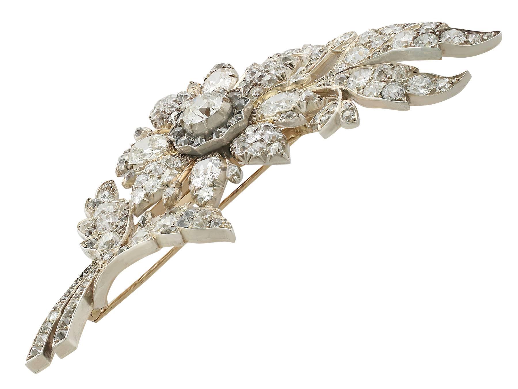 A magnificent and stunning, large antique Victorian 14.68 carat diamond and 9 karat yellow gold, silver set floral brooch; part of our diverse collection of antique jewelry/estate jewelry

This magnificent and stunning, large antique diamond brooch