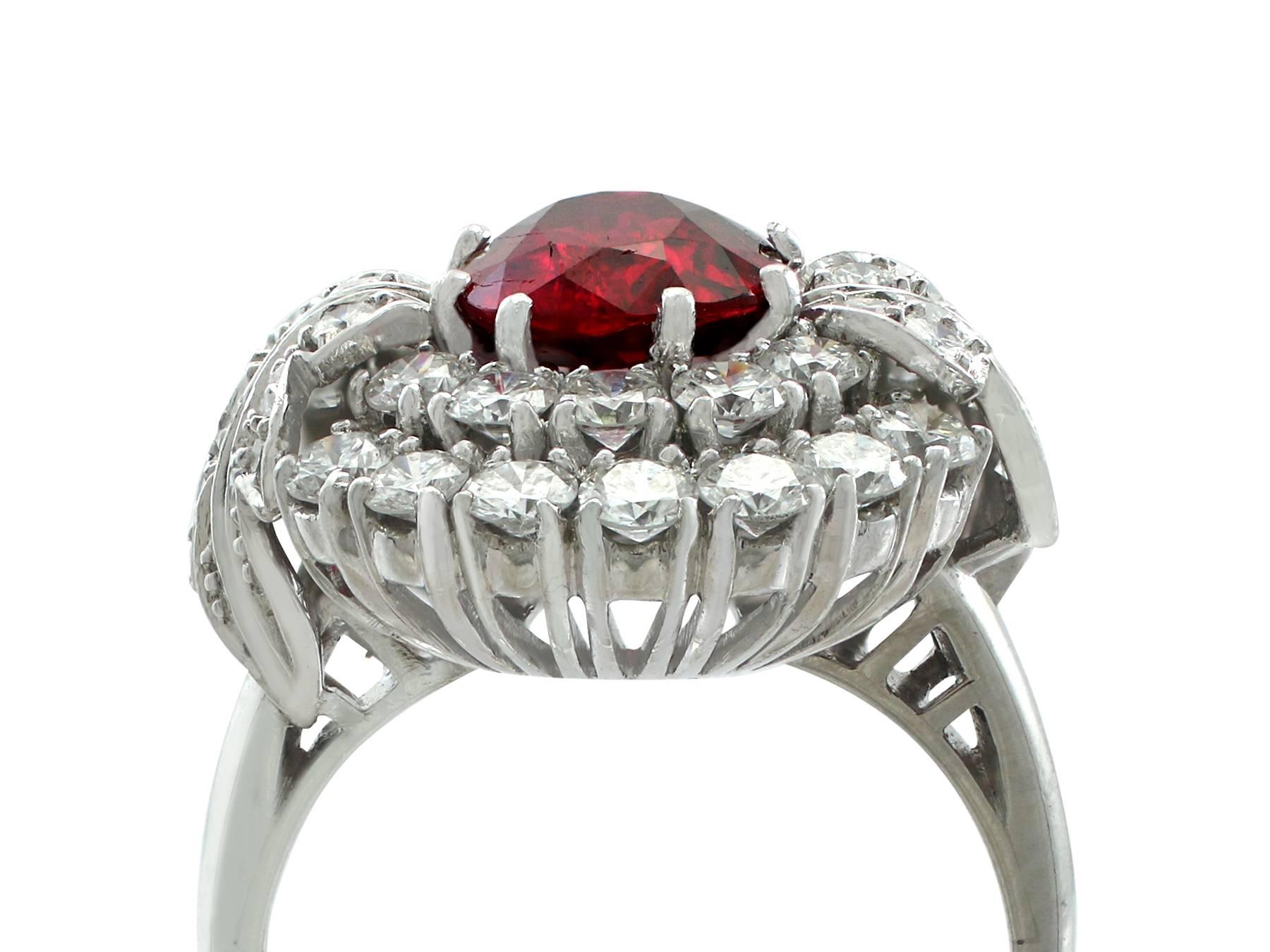 A stunning and impressive vintage 2.85 carat natural, unheated ruby and 2.48 carat diamond, platinum cocktail ring; part of our diverse vintage gemstone jewelry collections

This stunning, fine and impressive cushion cut ruby and diamond ring has