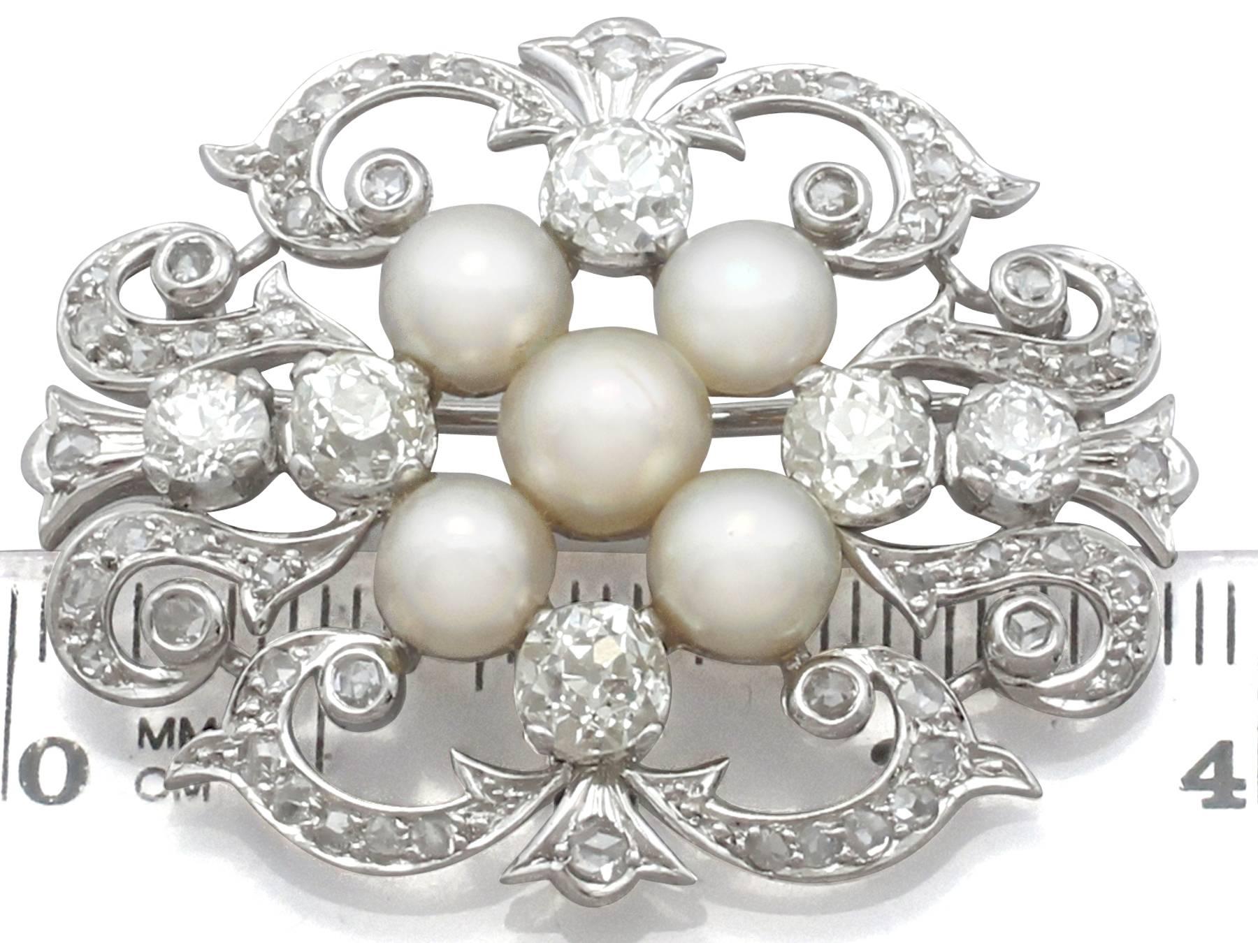 A stunning, fine and impressive 3.65 carat diamond and pearl, 18 karat white gold brooch; part of our antique jewelry and estate jewelry collections

This stunning antique pearl brooch has been crafted in 18k white gold.

The brooch is ornamented