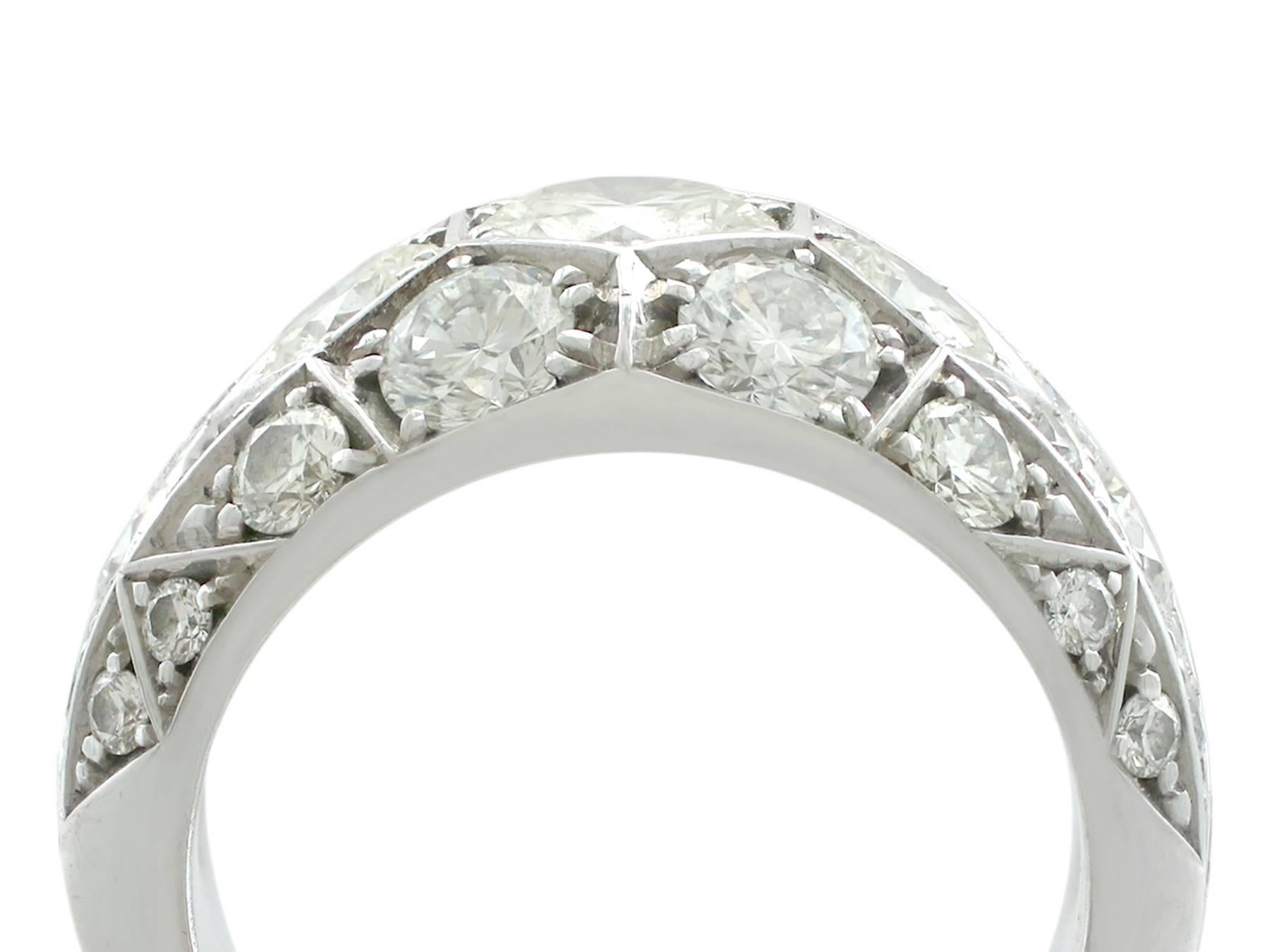 An exceptional, fine and impressive vintage white gold diamond dress ring; an addition to our diverse range of diamond jewelry

This exceptional vintage diamond dress ring has been crafted in 18 karat white gold.

The impressive domed geometric