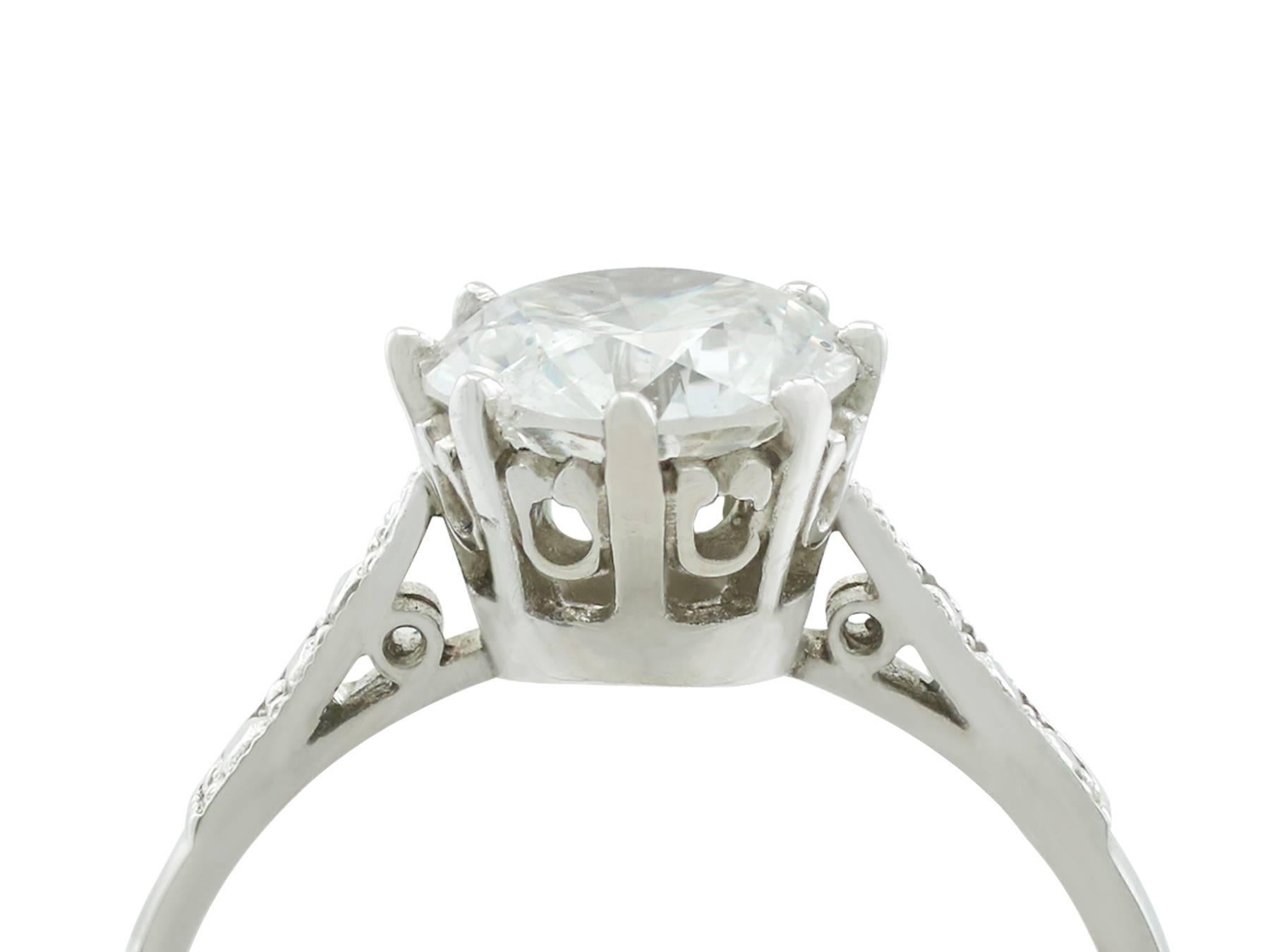An exceptional, fine and impressive vintage 1.85 carat diamond and contemporary platinum solitaire ring; part of our diamond jewelry/estate jewelry collections

This impressive diamond solitaire ring has been crafted in platinum.

The vintage 1.85