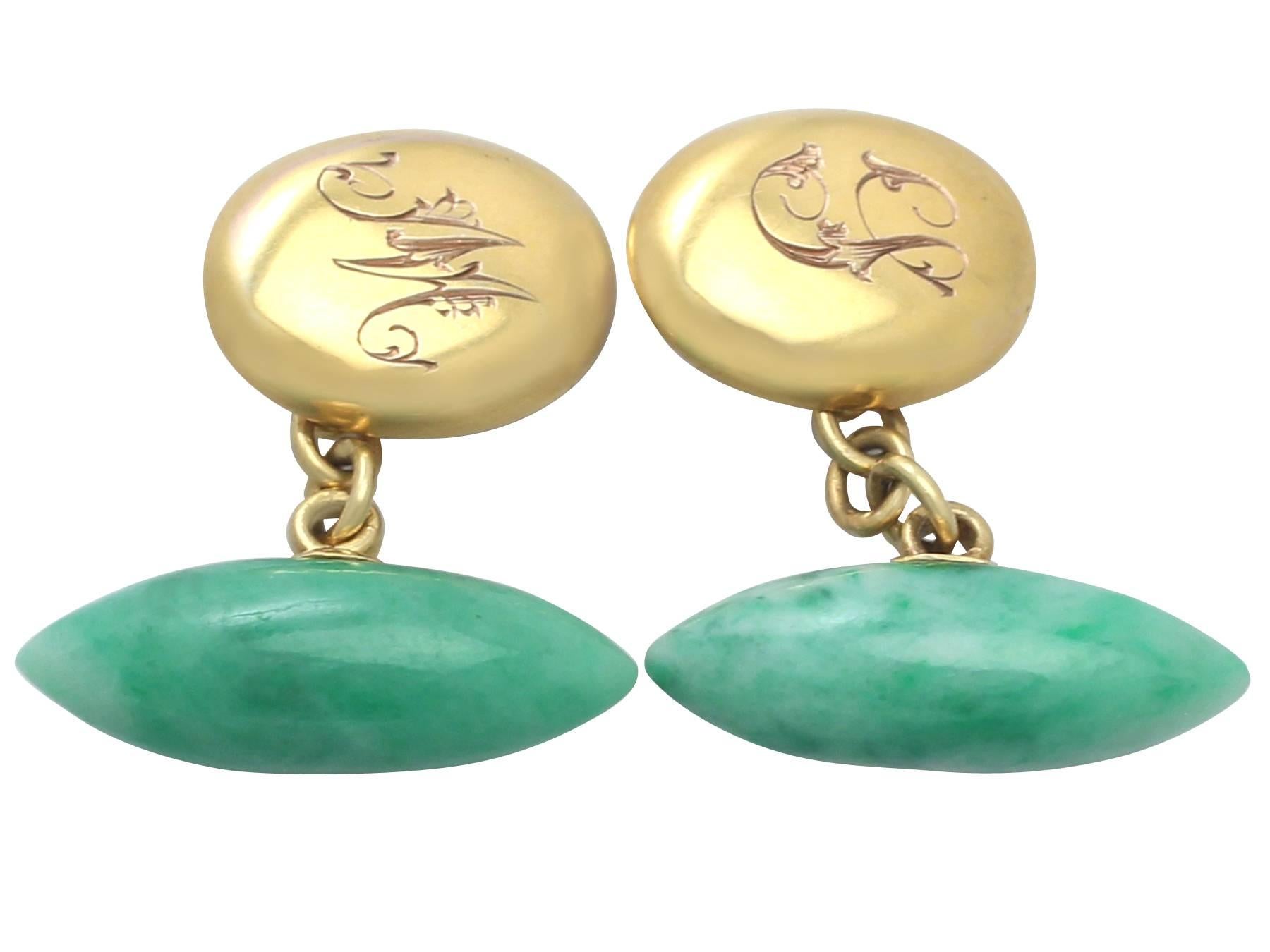 A fine and impressive antique pair of jade and 15 karat yellow gold cufflinks; part of our antique jewelry and estate jewelry collections

These impressive antique jade cufflinks have been crafted in 15k yellow gold.

The impressive feature torpedo