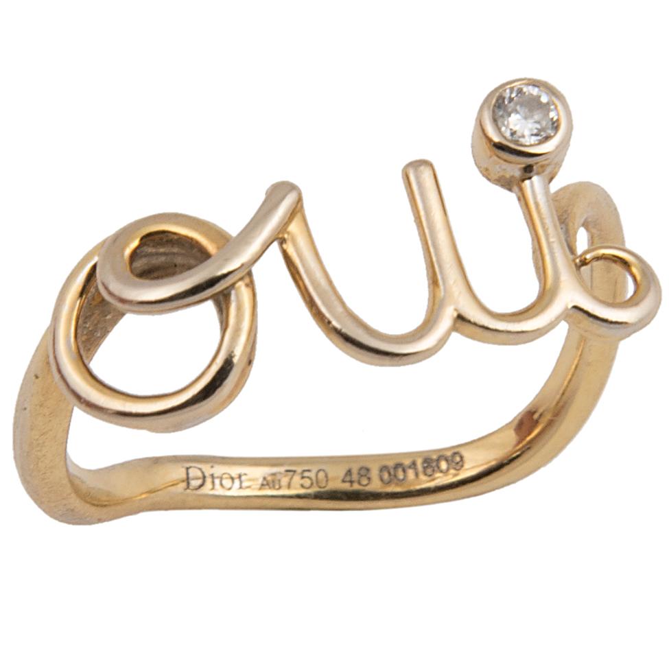 Ring from the “Oui “Collection by DIOR, the 18k yellow gold threat spells the word Oui.

‘Woven from threads of gold and topped with a diamond, the Oui ring shines with a joyful message, giving you an original way to say yes to your loved one’

Ring