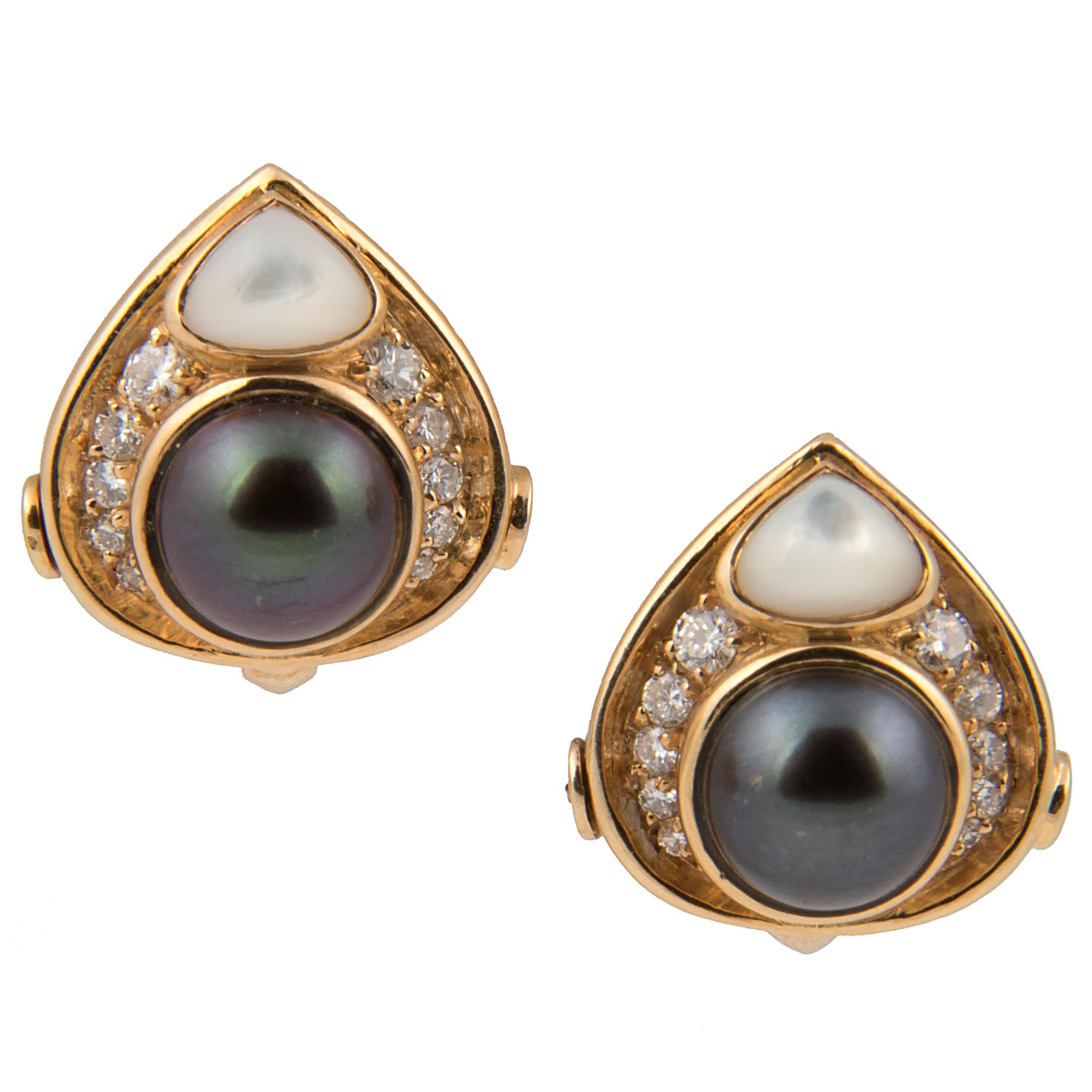 Pair of clip earrings called 'Pneus Perles' designed by Marina B, 18kt yellow gold, pavé set diamonds, black and white mother of pearl and Mabé cultured pearl. The earrings can be worn as pendant earrings or as studs.
Signed Marina B,  dated 1981,