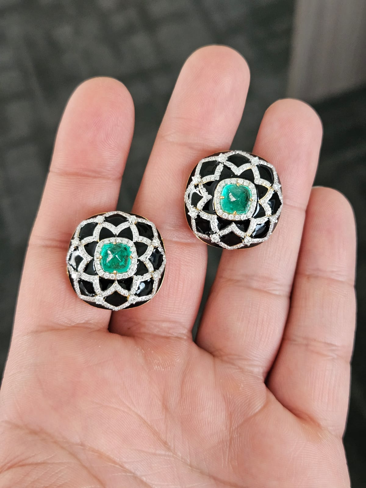 A very gorgeous and beautiful, Art Deco style, Emerald & Black Enamel Stud Earrings set in 18K Yellow Gold & Diamonds. The weight of the Emerald sugarloafs is 3.12 carats. The Emeralds are completely natural, without any treatment and are of