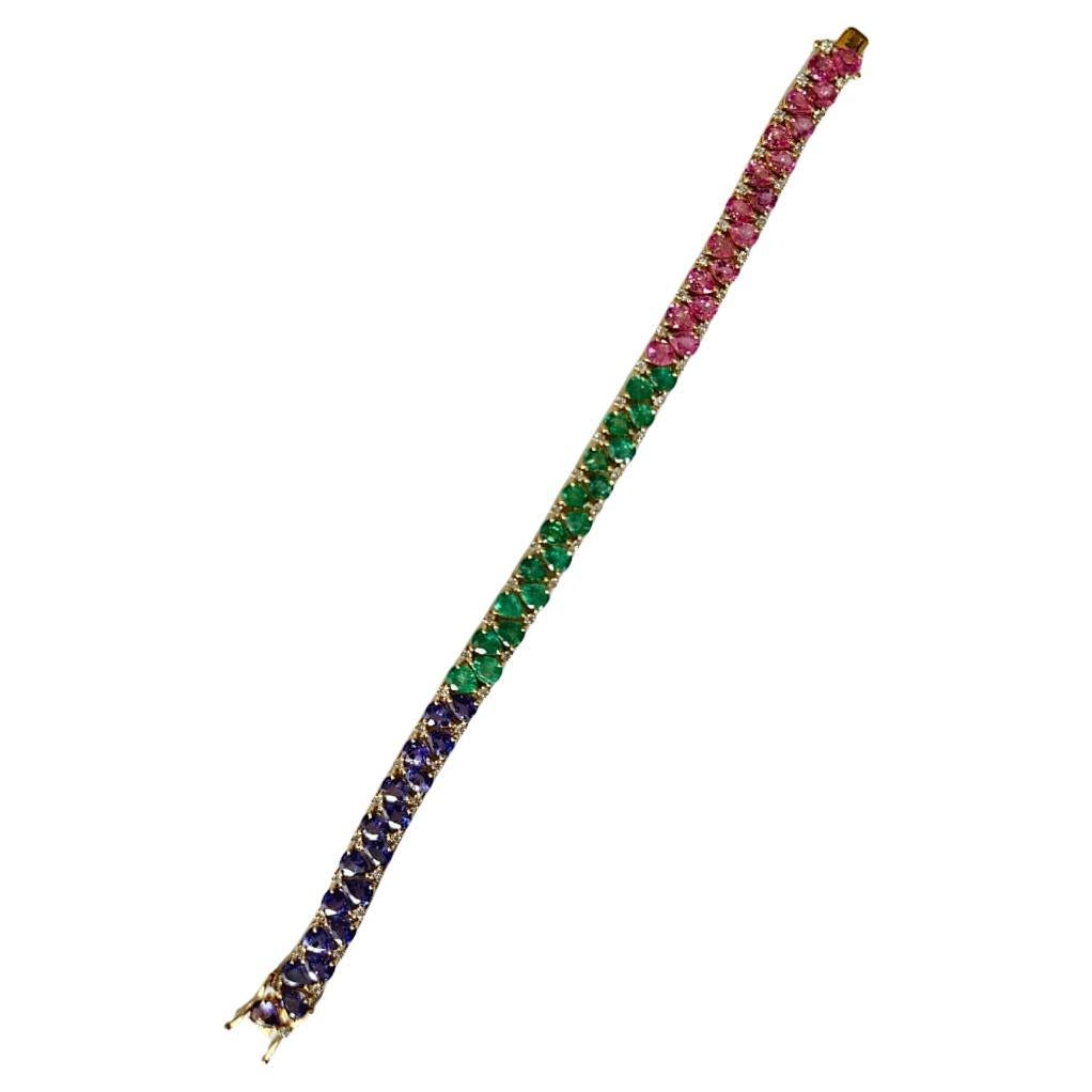 Pulsera moderna engastada en oro de 18 quilates, esmeraldas, zafiros rosas, tanzanitas y diamantes