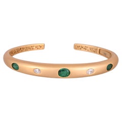 Bracciale con smeraldi naturali dello Zambia e diamanti, incastonati in oro giallo opaco 18 carati
