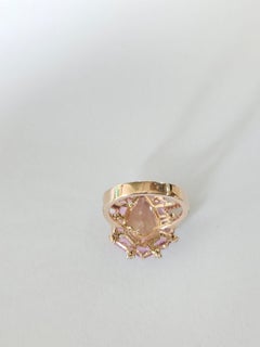 Anillo de compromiso de oro rosa de 18 quilates con morganita, zafiros rosas y diamantes