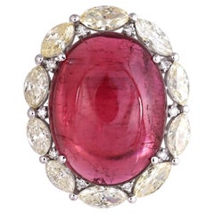 Anello di fidanzamento con tourmalina cabochon e diamanti, montato in oro 18 carati, 18,83 carati