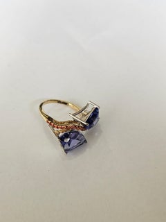 Set in 18K white Gold, Tanzanite & Orange Sapphire Toi et Moi Engagement Ring