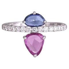 Set in 18K white Gold, Blue Sapphire, Pink Sapphire & Diamond Engagement Ring