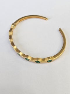 Set in 18K Yellow Matte Gold, natural Zambian Emerald modern Bangle Bracelet