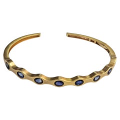 Set in 18K Yellow Matte Gold, Ceylon Blue Sapphire modern Bangle Bracelet