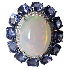 Set in 18K white Gold, Ethiopian Opal, Tanzanite & Diamond Dome Cocktail Ring