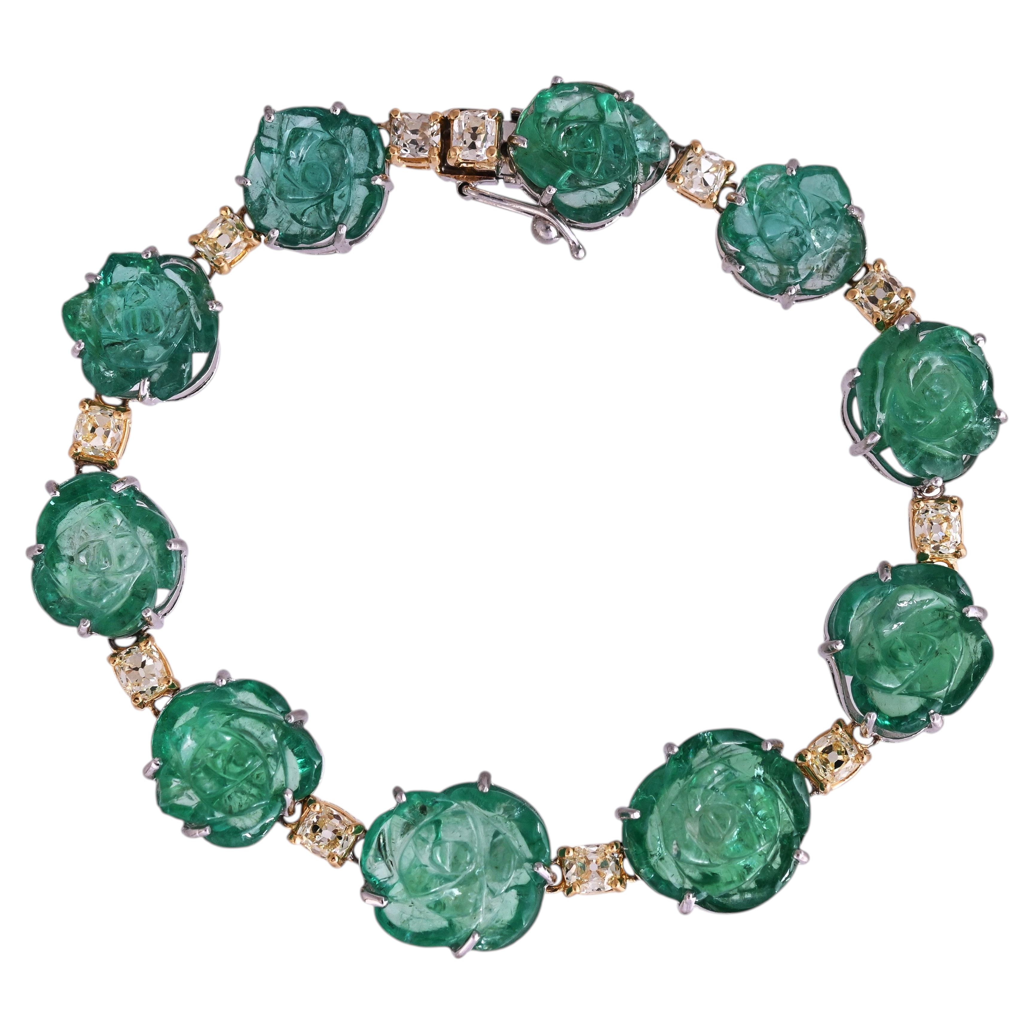 Set in 18K Gold, natural, hand-carved Zambian Emerald & Yellow Diamond Bracelet For Sale