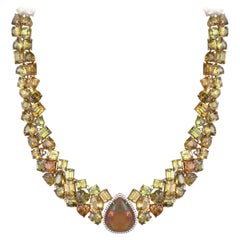 Set in 18K Yellow Gold, 231 carat Sphene, Ethiopian Opal & Diamond Link Necklace