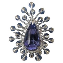 Bague cocktail moderne sertie d'or blanc 18 carats, de saphir bleu, de tanzanite et de diamants