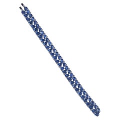 Pulsera de eslabones con zafiro azul de Ceilán (Sri Lanka) y diamantes, engastada en oro blanco de 18 quilates