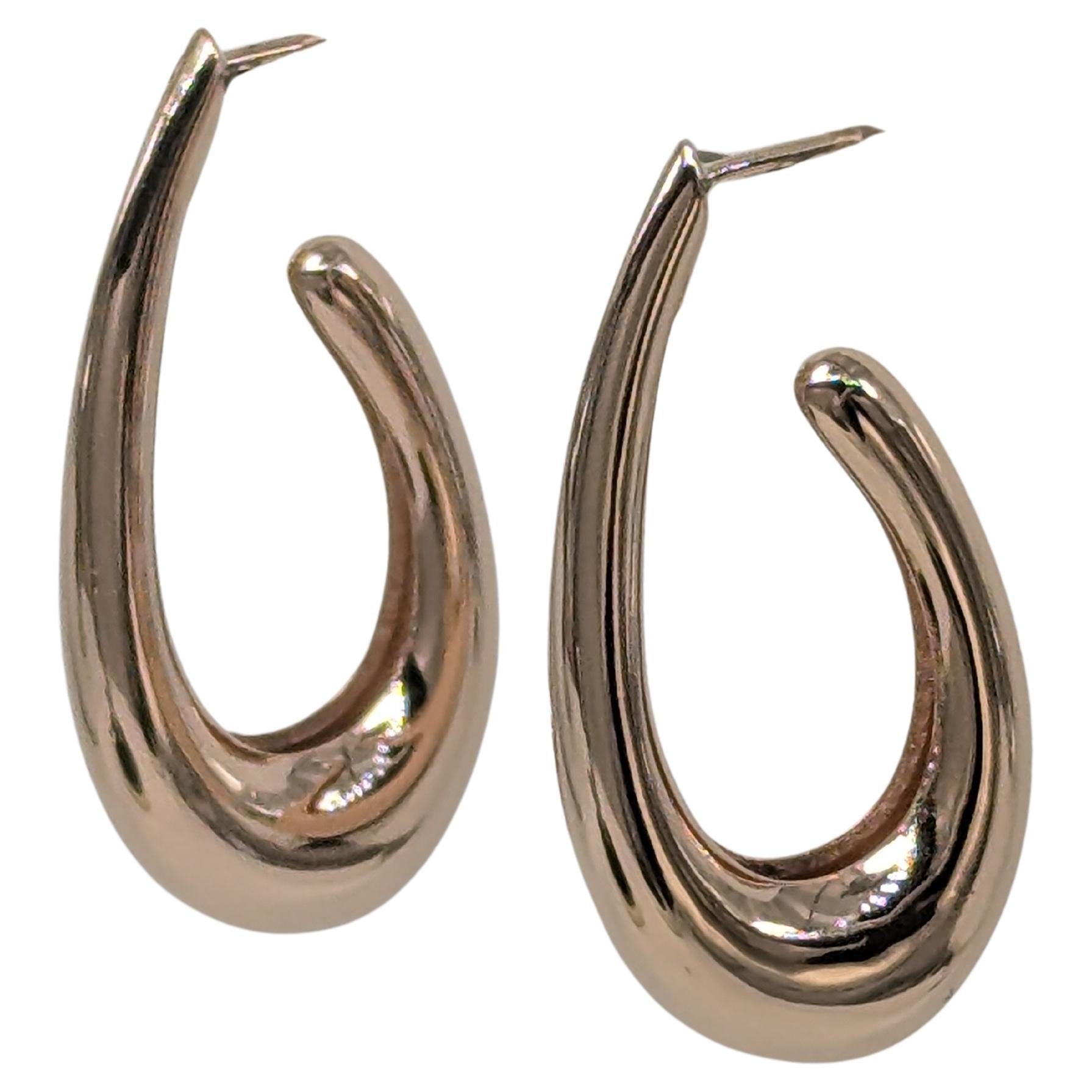 14 Karat Pink Gold Water Teardrops Hollow Hoop Earrings,  1 5/16 inch high x 5/8 inch wide. From the Teardrop Series. Though the times we live in may get us down for a day or so, Beauty can come out of ashes. I found tears are probably occurring
