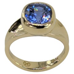 18 Karat Gelbgold 4,0 Karat Vivid Cushion Cut Blauer Saphir Skulptur Ring