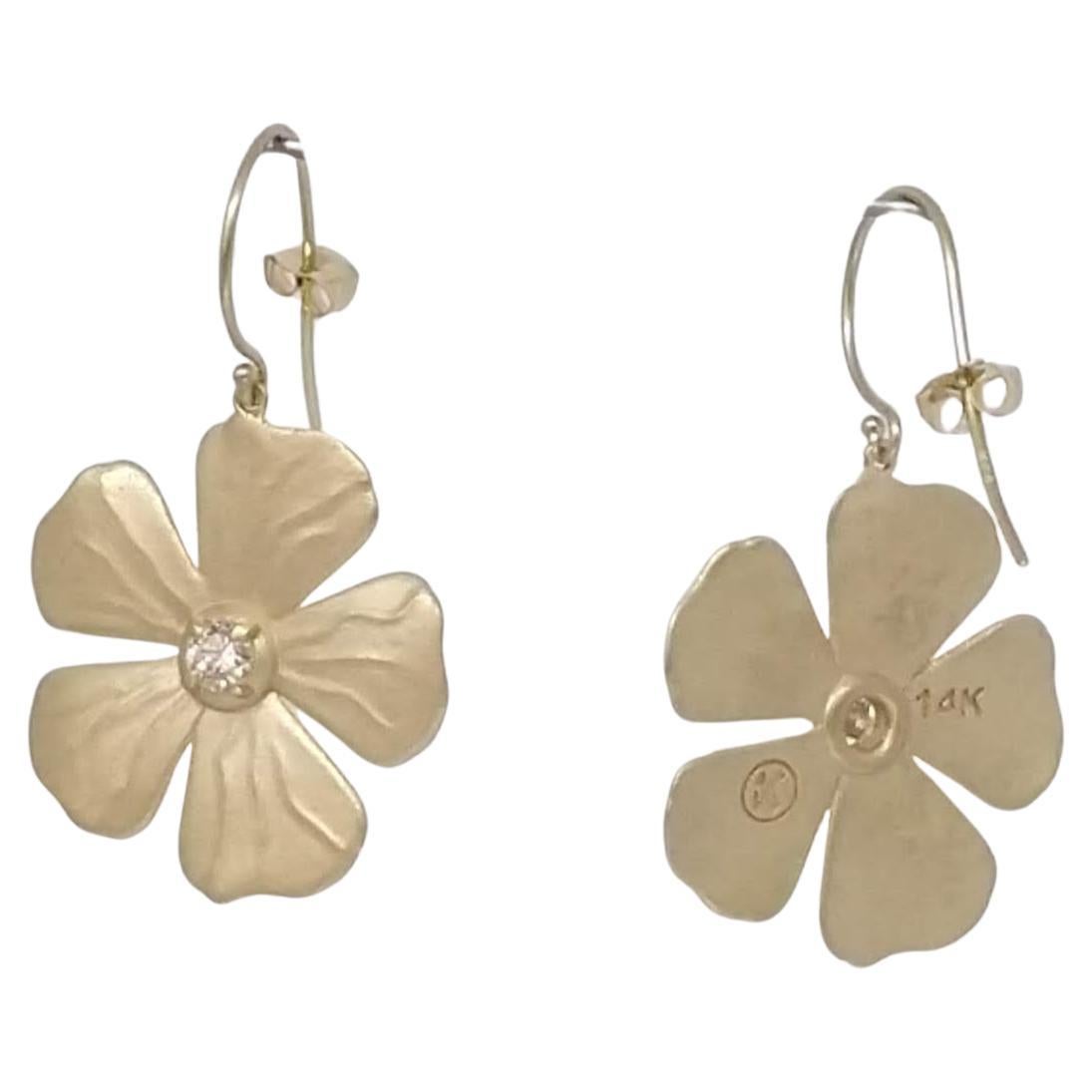 14 Karat Yellow  Diamond Periwinkle Flower Earrings, Tiffany designer, Thomas Kurilla sculpted these for 1stdibs. The periwinkle , a simple and elegant flower accented with a diamond center. Diamonds are  GIA -3.5 mm , .32 ct wt. , H ,SI1 . The