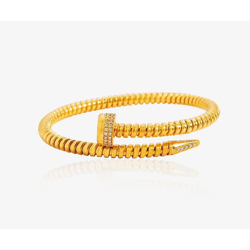 22K Handcrafted Flexible Tubogas Nail Bracelet with Diamonds
Gold Weight : 29.35 gr
Diamond : 0.67 ct