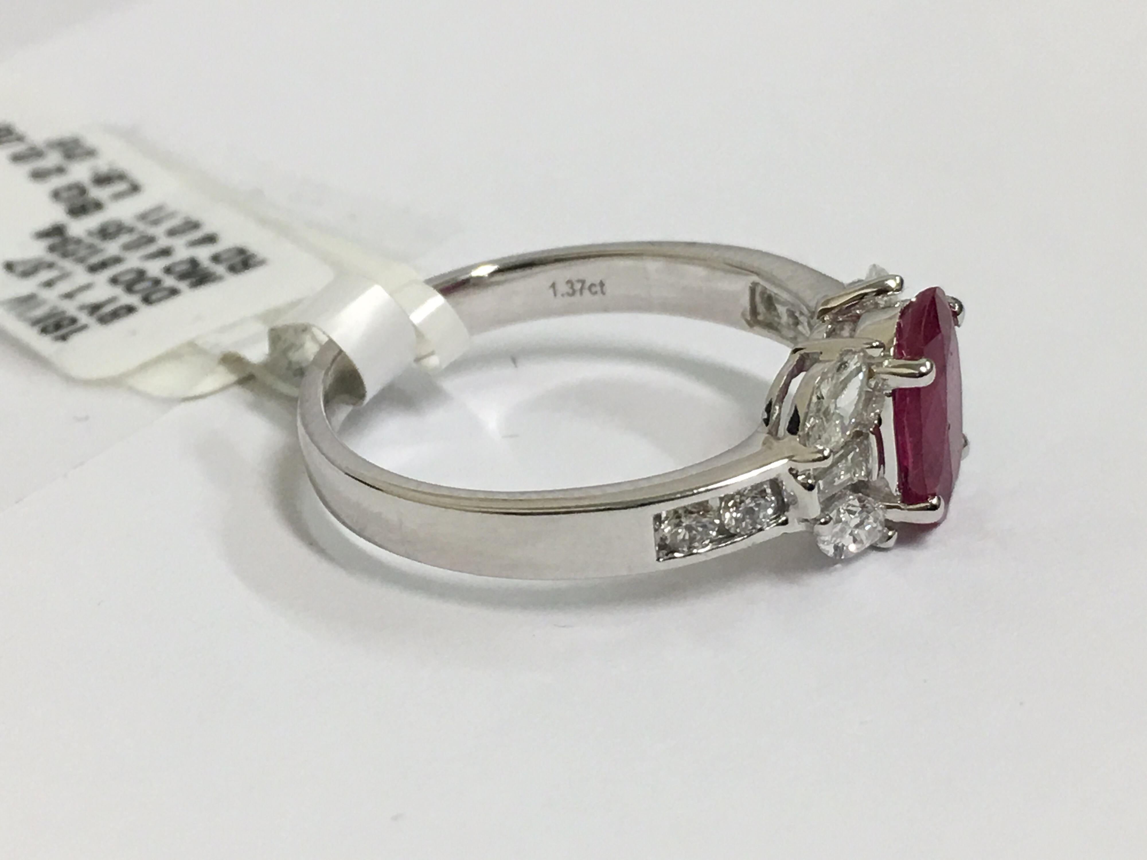 Natural Ruby weight is 1.37 Carat.
Diamonds weight is 0.46 Carat.
Size of the ring is 7 but can be resized.
Ring is set in 18 Karat White Gold.
