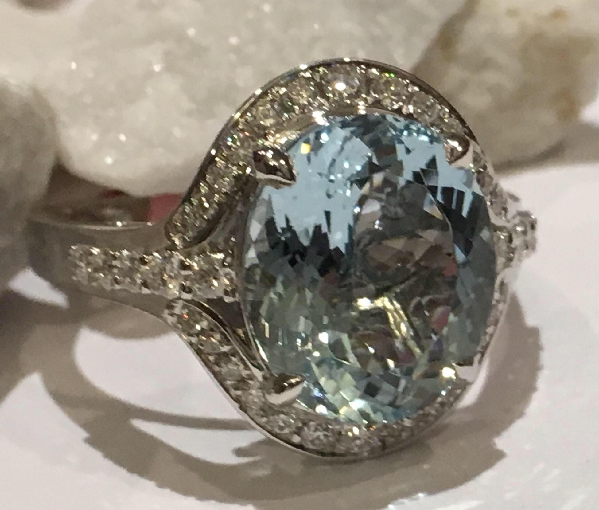 Oval Aquamarine 4.09 Carat and 0.38 Carat Diamonds set in 14K White Gold.
The Ring is size 7 and can be resized if needed.
This is one of a kind hand crafted Ring.