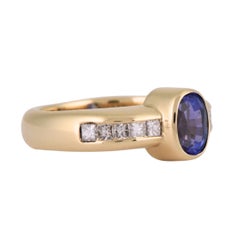 18K Yellow Gold Oval Tanzanite & Princess Cut Diamond Ring