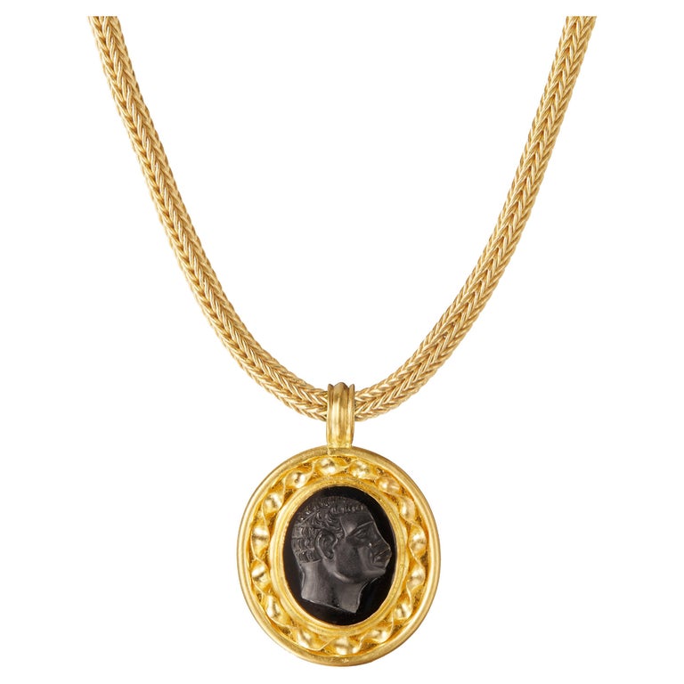 Gold and Onyx Cameo Pendant For Sale