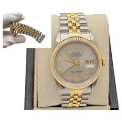 Rolex Datejust 16233 36mm Silver Roman Dial 18k Yellow Gold Stainless Steel