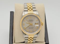 Rolex Datejust 16233 36mm Silver Roman Dial 18k Yellow Gold Stainless Steel
