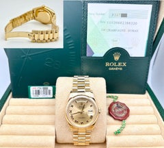 Rolex Day-Date President 118208 de 2005, cadran romain couleur champagne, boîtier en or 18 carats, avec boîte et papiers