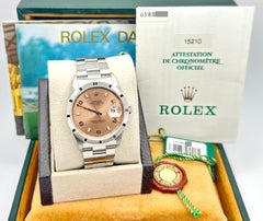 Rolex Date 15210 34mm Salmon Arabic Dial Engine Turned Bezel Steel Box Paper