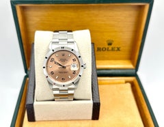 Rolex Date 15210 34mm Salmon Arabic Dial Engine Turned Bezel Steel Box Paper
