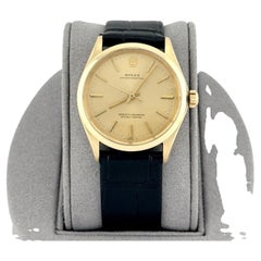 Rolex Oyster Perpetual 1002 34mm Champagne Dial 14k Yellow Gold