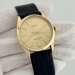 Rolex Oyster Perpetual 1002 34mm Champagne Dial 14k Yellow Gold