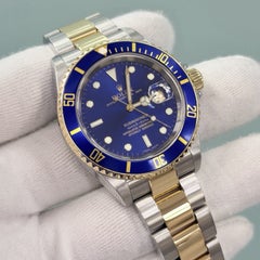 2005 Rolex Submariner Date Blue 16613 40mm Blue Dial 18k Gold Steel Box Paper