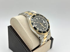 Rolex Submariner Date Black 16613 40mm 18k Yellow Gold Stainless Steel Box Paper